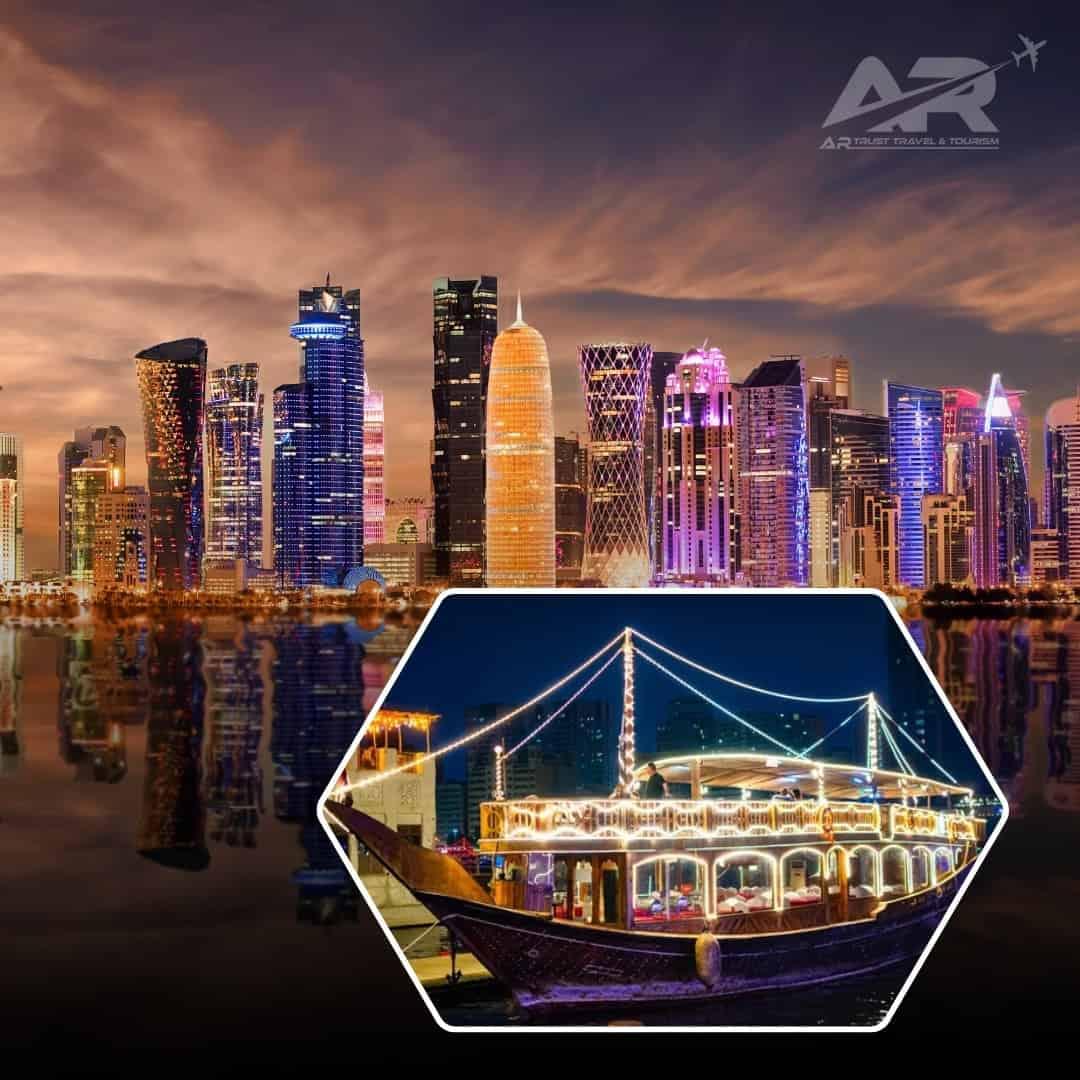 Qatar Doha skyline at night with a traditional dhow boat illuminated on the water.